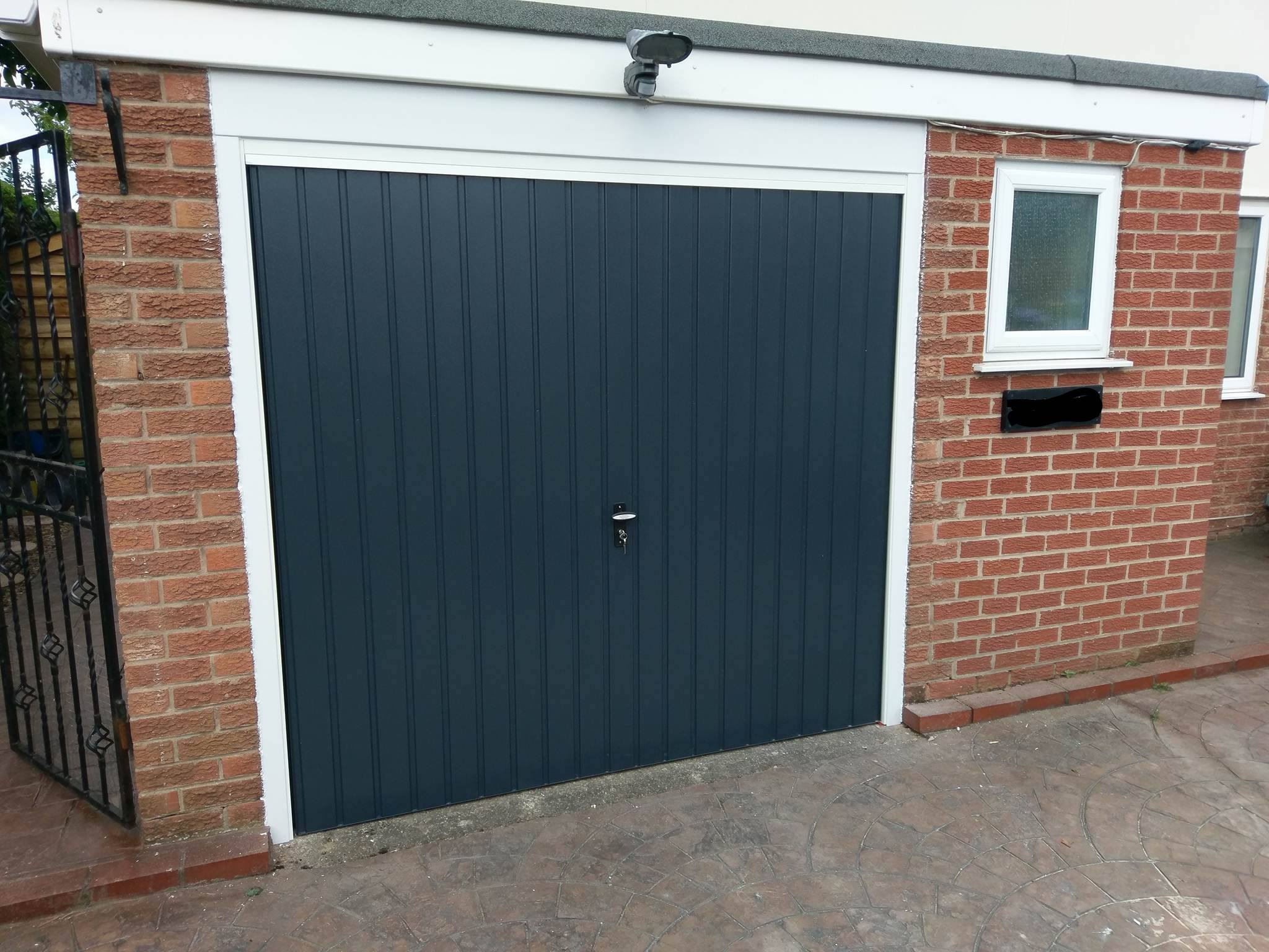 steel up and over garage door in anthracite grey installed by Arridge